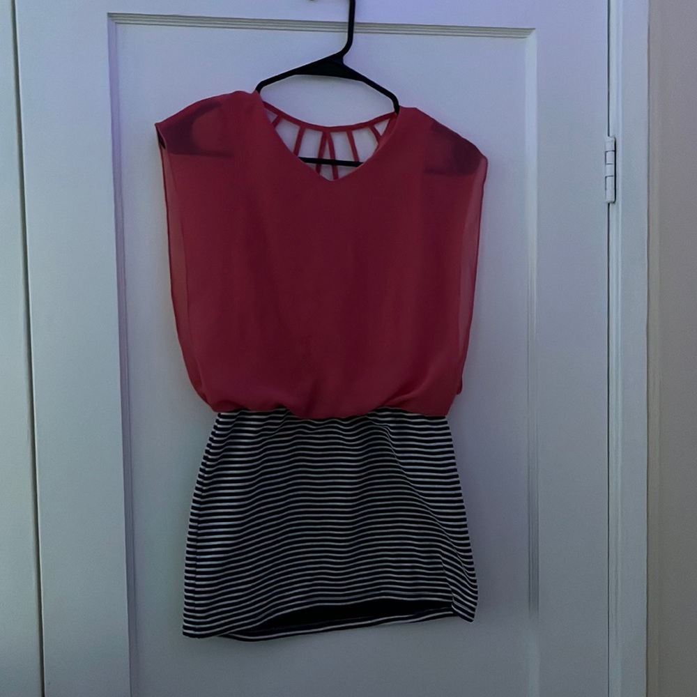 Pink dress with navy blue and white stripes on the bottom